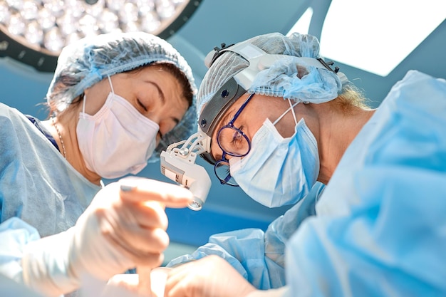 Midsection of child holding hands