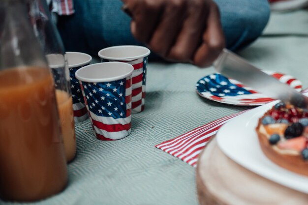 Midsection of coffee cup on table