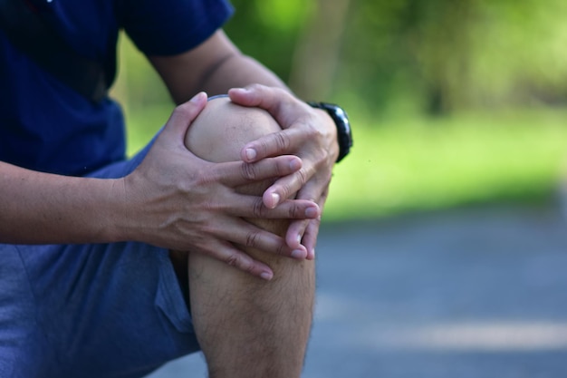 midsection of couple hands on water