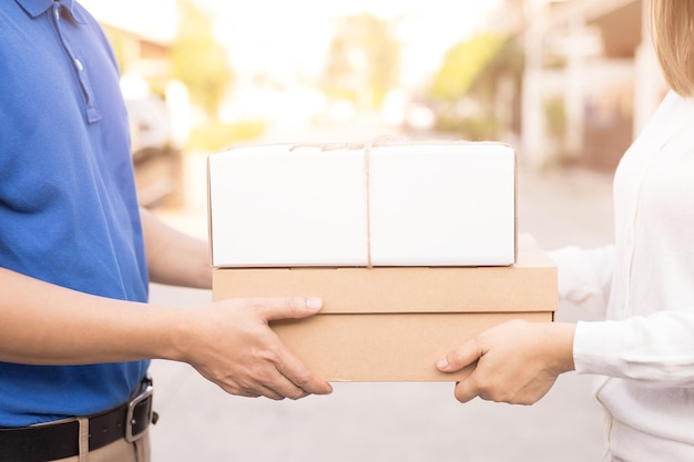 Photo midsection of couple holding hands in box
