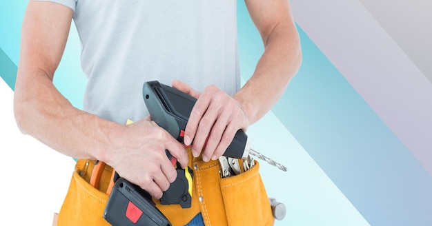 Midsection of handy man holding drill on blue and white stripes