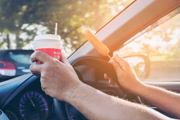 Photo midsection of man in car