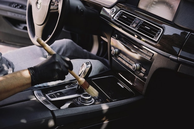 Photo midsection of man cleaning car