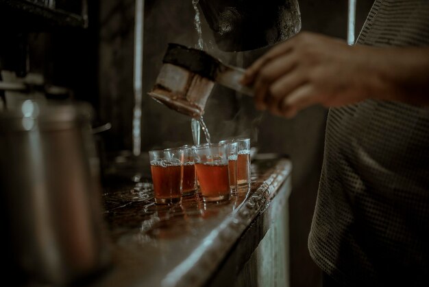 Photo midsection of man drinking glass