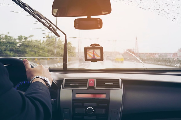 Photo midsection of man driving car