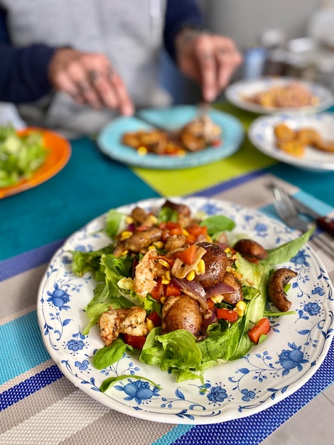 Midsection of man having food on table