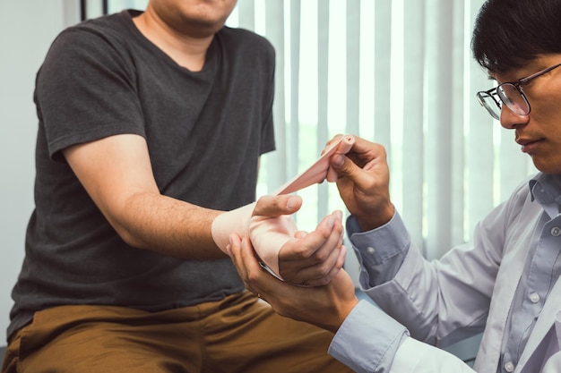 Midsection of man holding hands