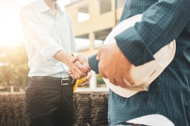 Midsection of man holding hands