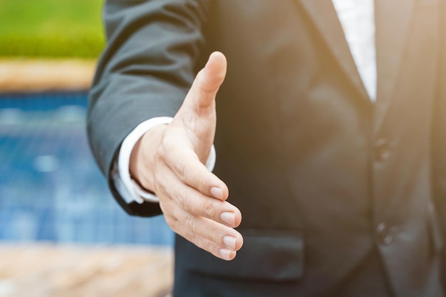 Photo midsection of man holding hands