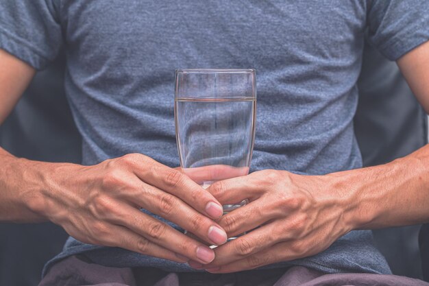 Photo midsection of man holding ice cream