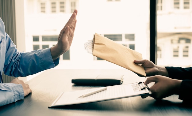 Photo midsection of man holding paper