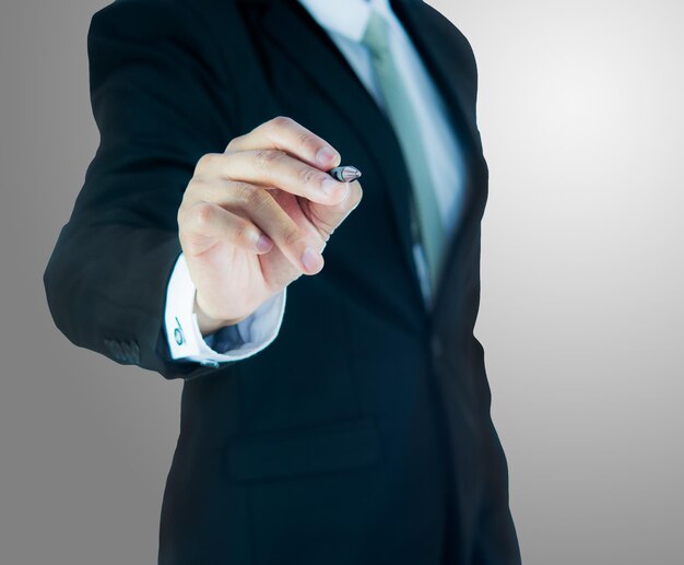 Midsection of man holding umbrella