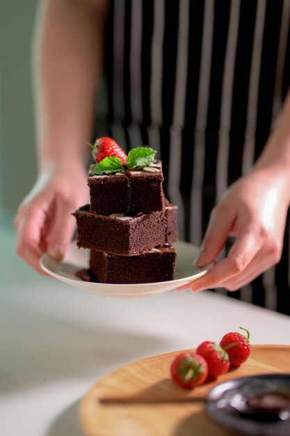 Midsection of man preparing cake