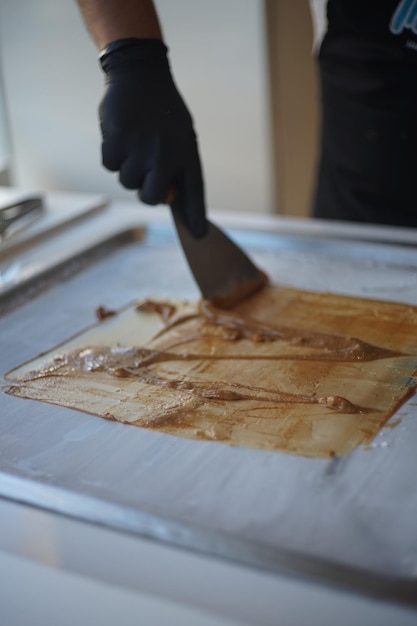 midsection of man preparing food in kitchen