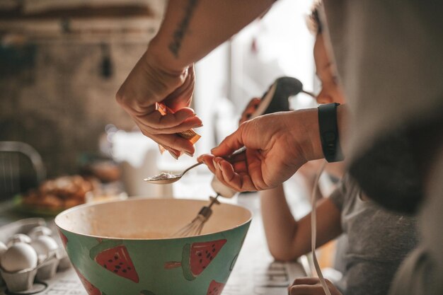 Midsection of man preparing food on table