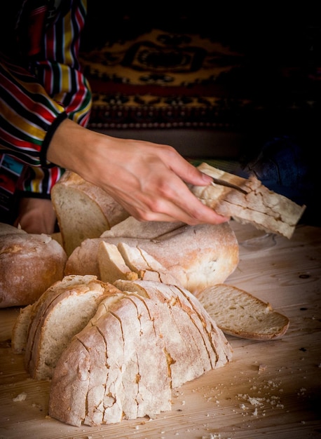 Midsection of man preparing food on table