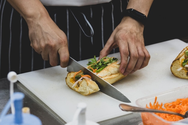 Photo midsection of man preparing food on table