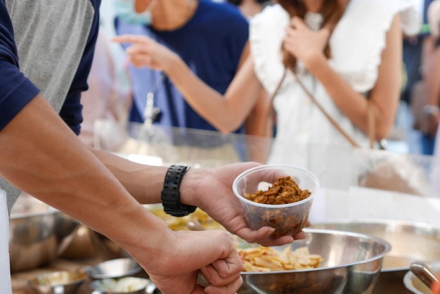Midsection of man preparing food
