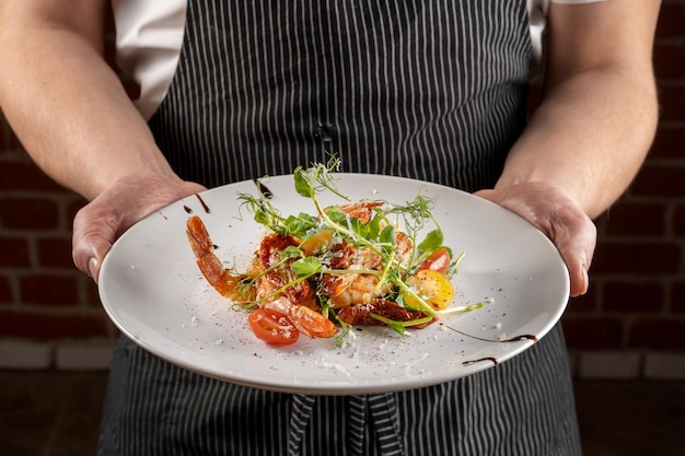 Midsection of man preparing food