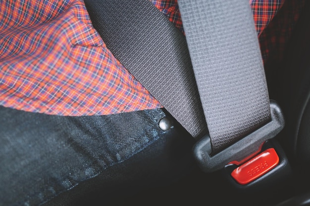 Photo midsection of man sitting in car