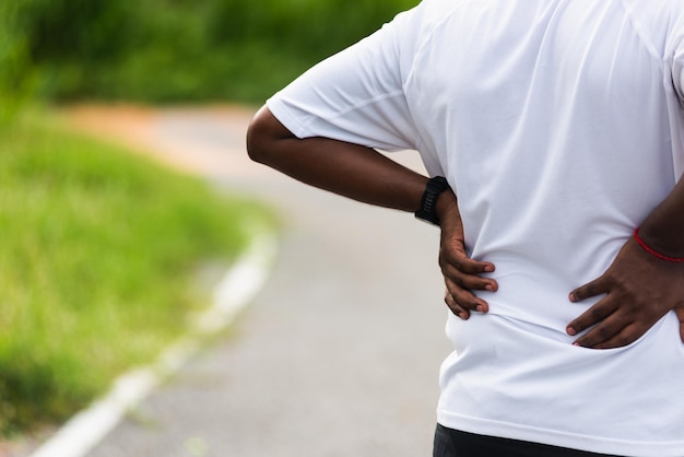 Photo midsection of man suffering from pain