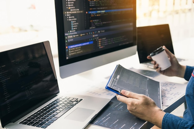 Midsection of man using laptop