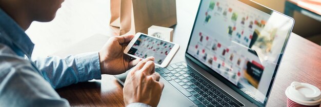 Midsection of man using laptop