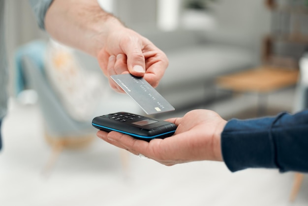 Photo midsection of man using mobile phone