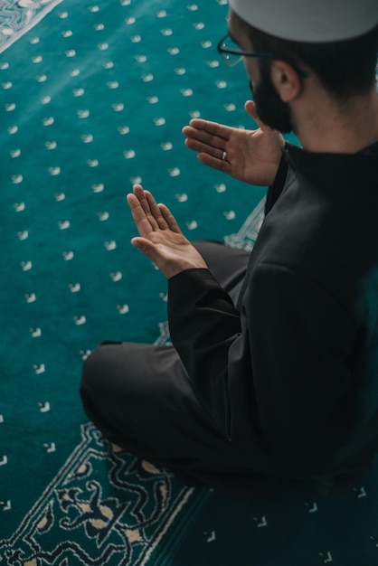 midsection of man using mobile phone