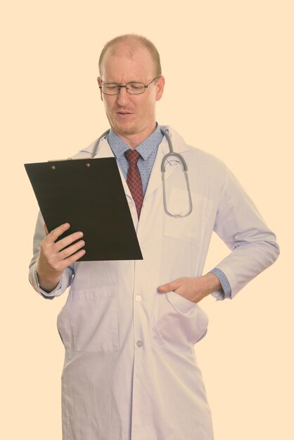 Photo midsection of man using smart phone against white background