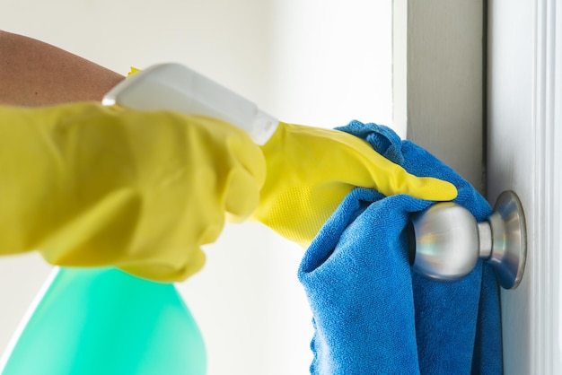 Midsection of man wearing mask at home