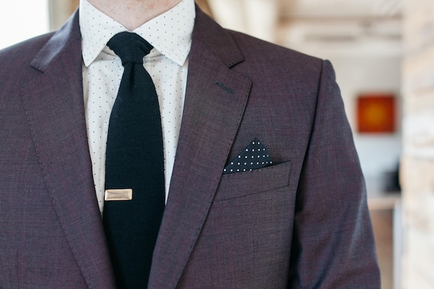 Photo midsection of man wearing suit