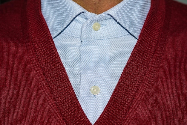 Midsection of man wearing sweater