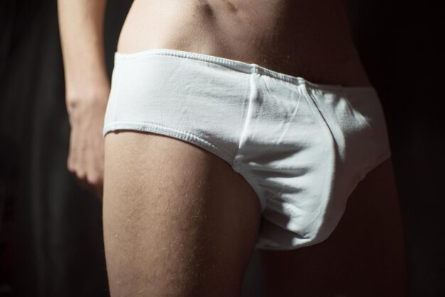 Photo midsection of man wearing underwear
