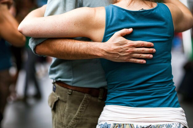 Midsection of man and woman dancing tango