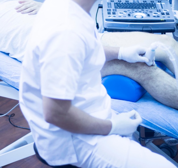 Midsection of man working on bed