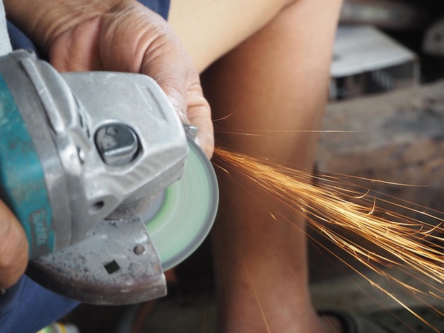 Photo midsection of man working in factory