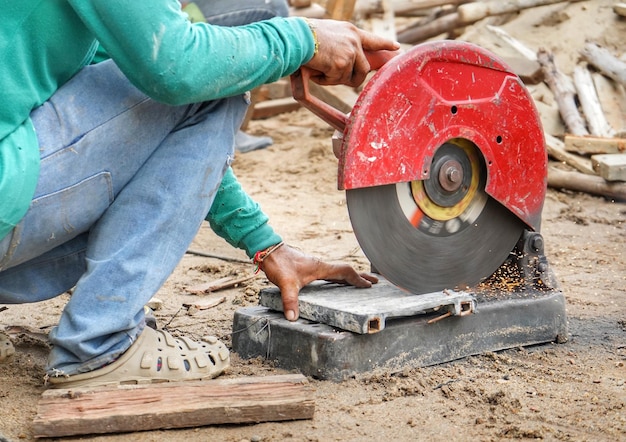 Photo midsection of man working on metallic structure