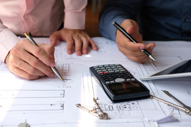 Midsection of man working on table