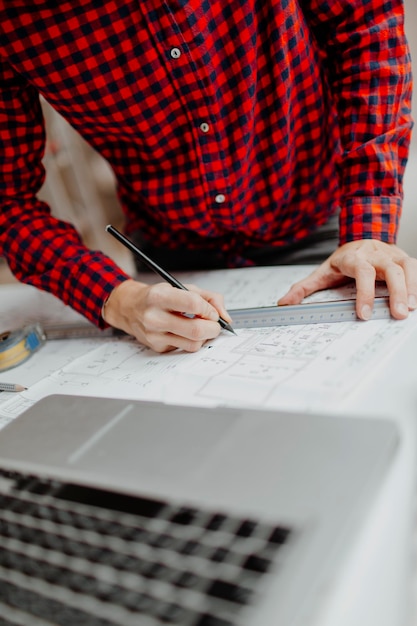 Midsection of man working on table