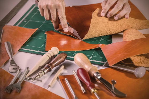 midsection of man working on table