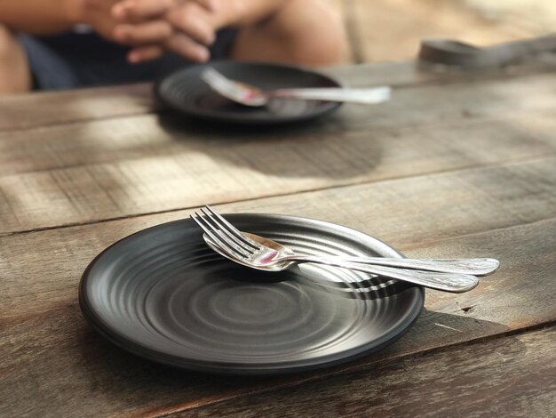 Midsection of man working on table