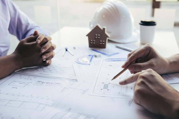 Midsection of man working on table