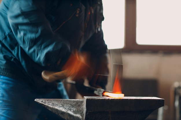 Midsection of man working at workshop