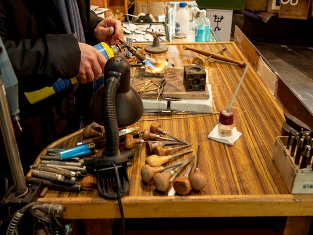 Photo midsection of man working at workshop