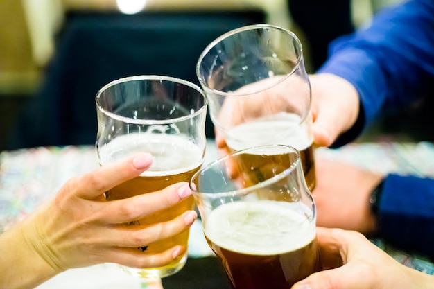 Photo midsection of people drinking glass