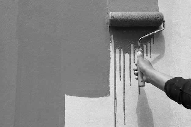 Photo midsection of person holding door of house