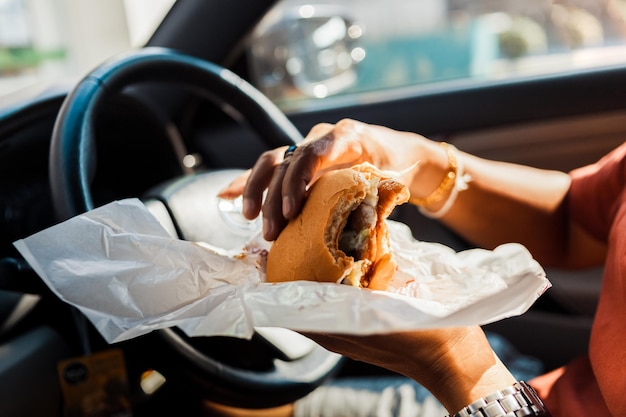 Midsection of person holding food