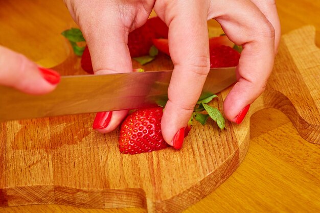 Photo midsection of person holding ice cream on cutting board