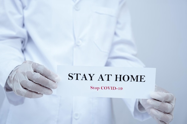 Midsection of person holding text against white background